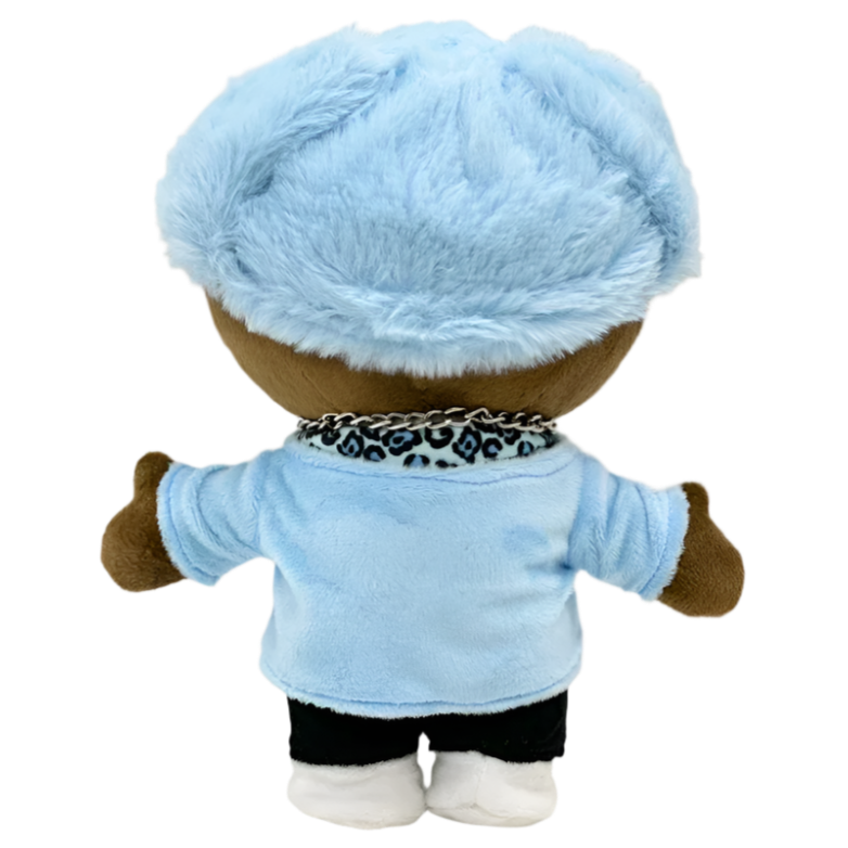 Plush toy with a blue outfit and hat on a white background