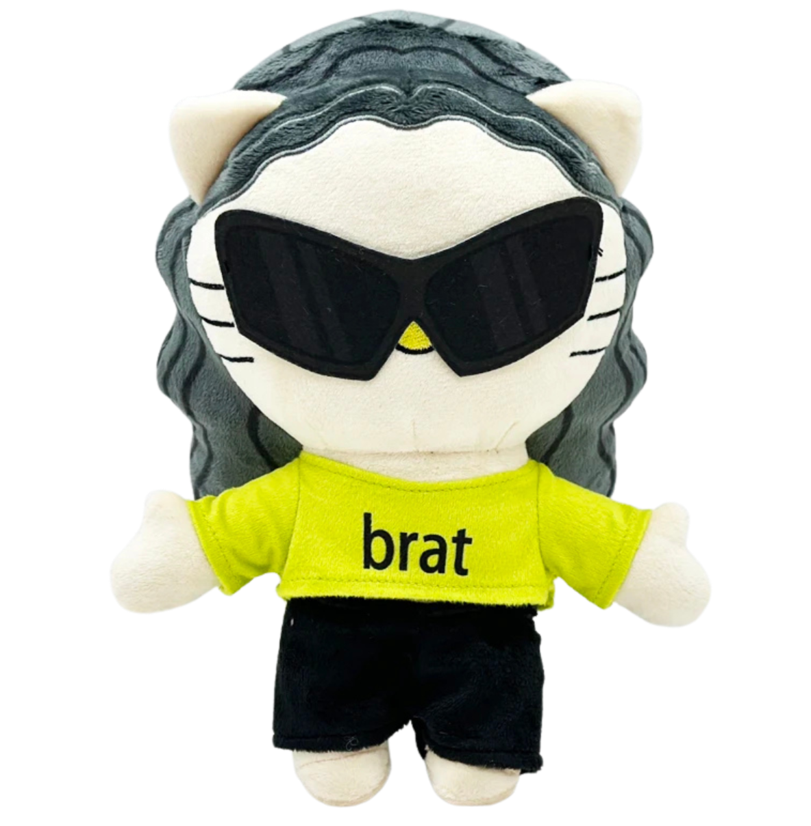 Plush toy resembling a cat with sunglasses and a 'brat' shirt on a white background
