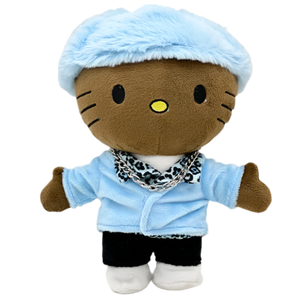 Plush toy resembling a cat in a light blue outfit with a white background