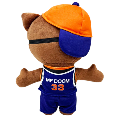 Plush toy with orange and blue cap, blue shorts, and 'MF DOOM 33' shirt on a white background